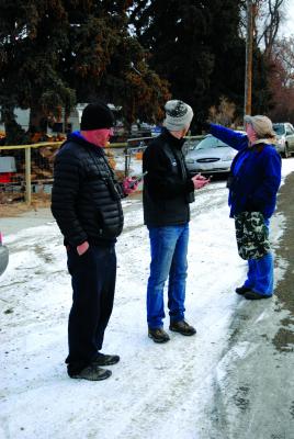 Tom Forwood, Jr., Andrew Guttenberg and Nancy Whiting tally birds seen in downtown Sheridan. (J.Taylor)