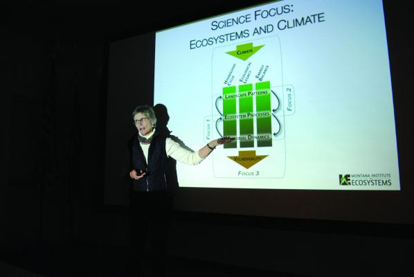 Dr. Cathy Whitlock, a professor of Earth Sciences at Montana State University (MSU), and a fellow with the Montana Institute on Ecosystems told a packed Ennis fire station that warming due to climate change is already here on Wednesday, Nov. 28. (J. Taylor)