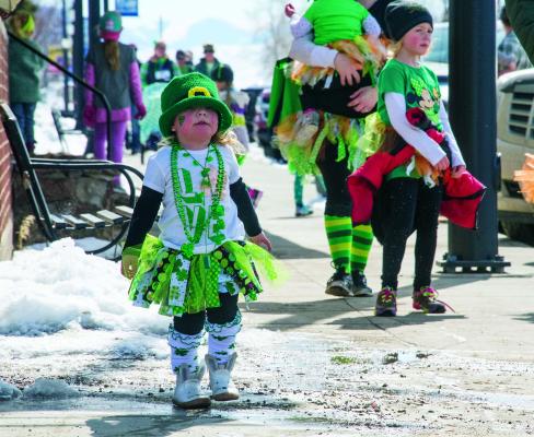 Competitors and spectators alike donned their best festive green costumes for Sheridan’s Leprechaun Dash. Prizes were given out for fastest times in the 5k, 1-mile and 100-yard races, as well as for best costume.