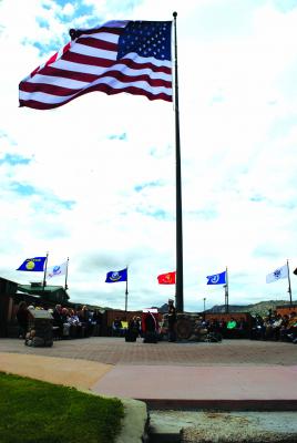 Flags waving Flags flutter at the DeBona memorial service. Lt. Col. Andrew DeBona passed away in February, but the memorial service to honor him and his life was held May 19. (J. Taylor photos)