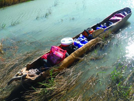 Paddling the Missouri in 2014 in a dugout canoe.
