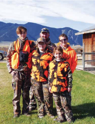 A family travelled from Wisdom October 21 for the Youth Hunt (two days set aside by FWP specifically to allow younger folks to get first crack at the big game season). Left to right: Andrew Lewis, Cynthia Lofftus, Justin Krogedal, Joshua Lewis, and Darrell Lewis. PHOTO COURTESY DAVE DELIS