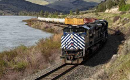 A Montana Rail Link freight train travels along the Flathead River near Perma, Montana. PHOTO COURTESY JUSTIN FRANZ