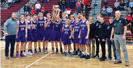 The Wildcats grin as they receive their third place District title. Harrison took third place after winning the consolation game. PHOTO COURTESY TIMBRE MURPHY