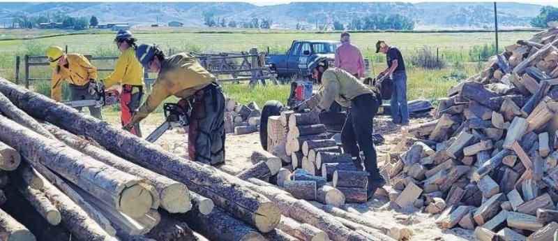 The hardworking Firewood Bank of the Ruby Valley received a pleasant surprise on Thursday, Aug. 4 when an energetic team of DNRC firefighters from Dillon joined them to help for the day. PHOTOS COURTESY FIREWOOD BANK OF THE RUBY VALLEY