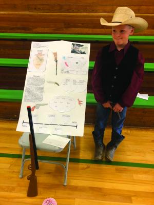 Howdy, pilgrim! John Wayne (Tyler Simmons) explains the film career of the man born Marion Mitchell Morrison.