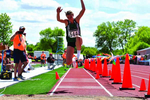 Jourdain Klein competes in triple jump at the MHSA state track and field championships in Great Falls on May 26. (Submitted)
