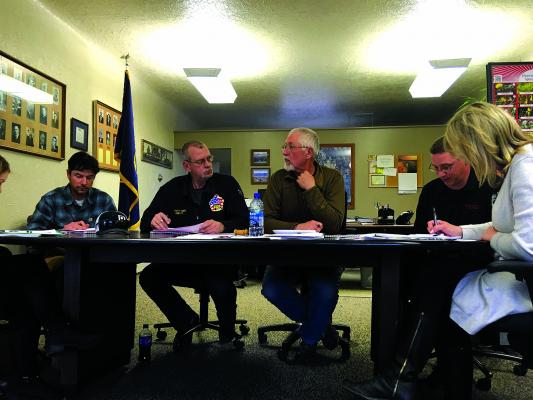 Above – Councilmen Dan Durham and Rahn Abbott, along with Mayor Bob Stump, Councilman Mike Walter and Clerk Ginger Galiger consider water issues confronting Sheridan with wells new and old at their April meeting. (J. Taylor)