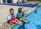 Sheridan locals, Braeden and Mallory Gilman, hang out poolside at the Sheridan public pool Aug. 14. Photo by Susanne Hill
